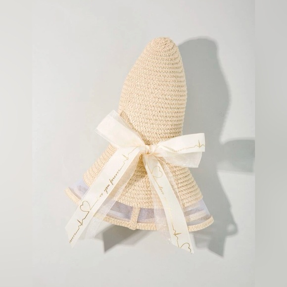 Straw hat with ribbon bow decor - Picture 2 of 3